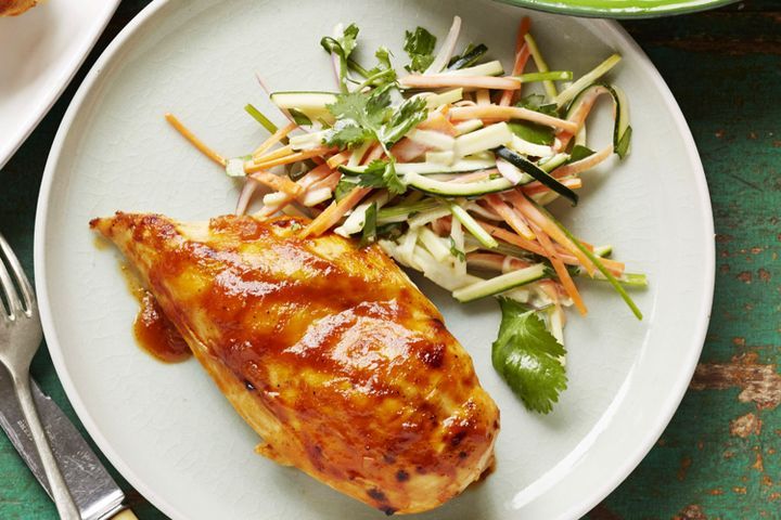 Cooking Meat Barbecue chicken with carrot-zucchini slaw