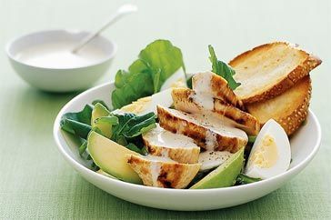Cooking Meat Chicken, avocado and rocket salad with garlic croutons