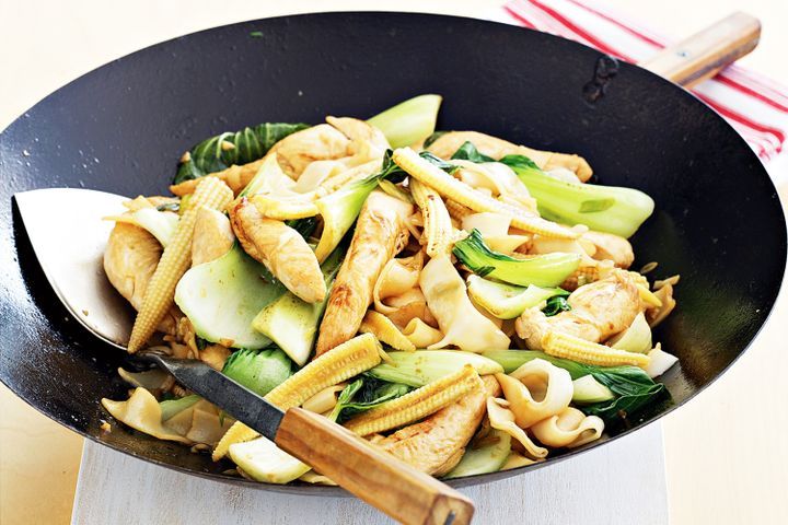 Cooking Meat Chicken, bok choy and baby corn stir-fry