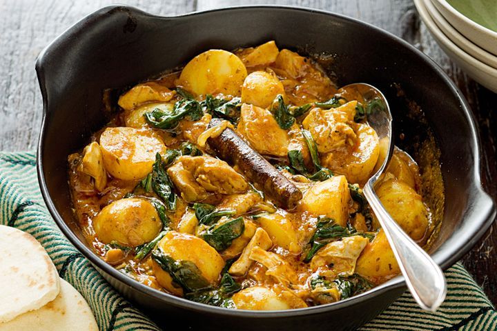 Cooking Meat Chicken, potato and spinach curry