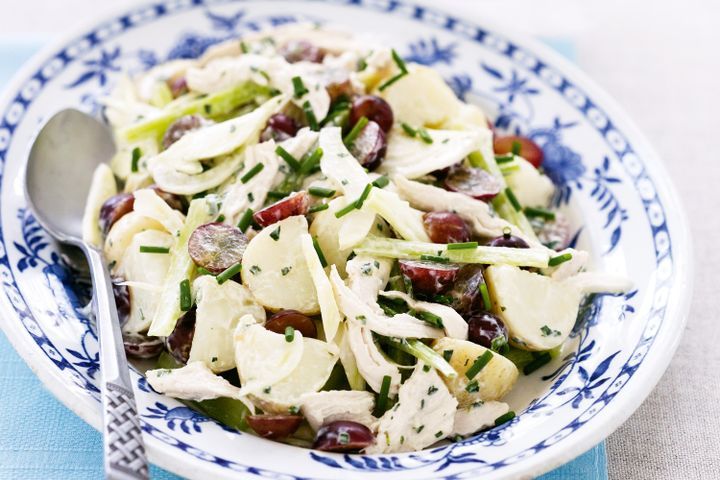 Cooking Meat Chicken and potato salad with grape and fennel