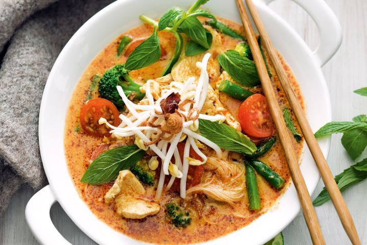 Cooking Meat Chicken and vegetable laksa