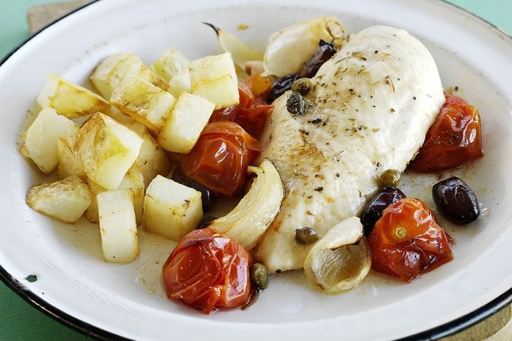 Cooking Meat Chicken with cherry tomatoes, olives and capers