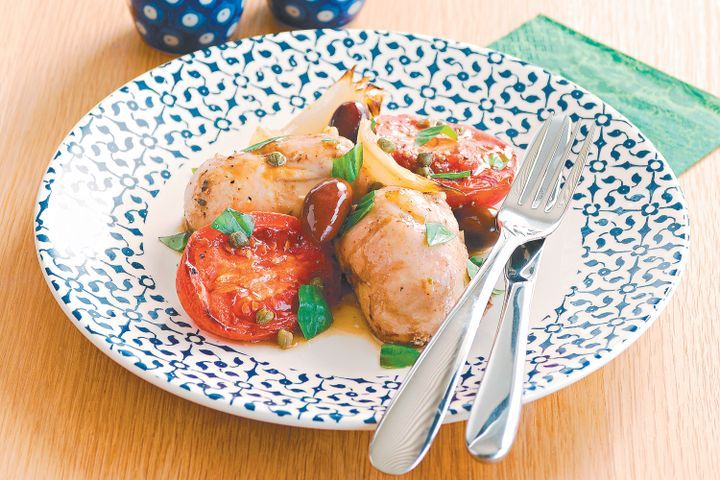 Cooking Meat Chicken with tomatoes, olives and capers