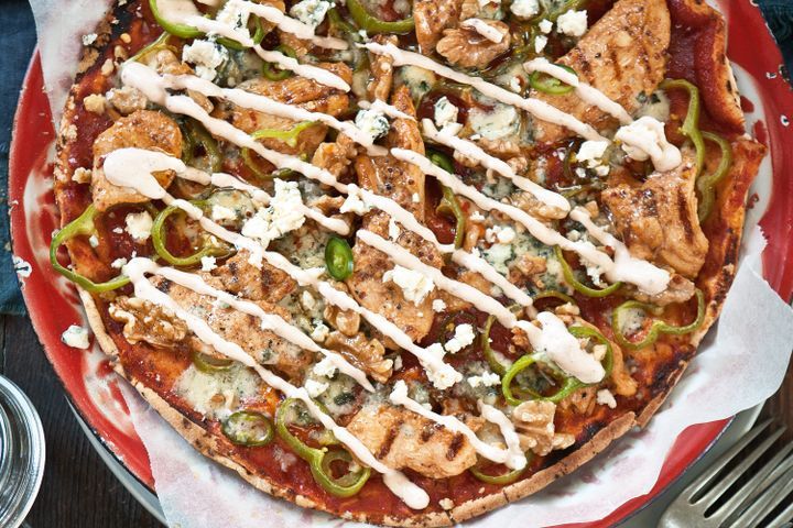Cooking Meat Chipotle chicken pizza with walnuts and blue cheese