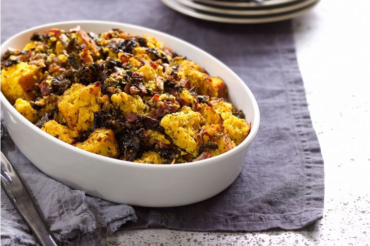 Cooking Meat Cornbread stuffing with kale, bacon, and pecans