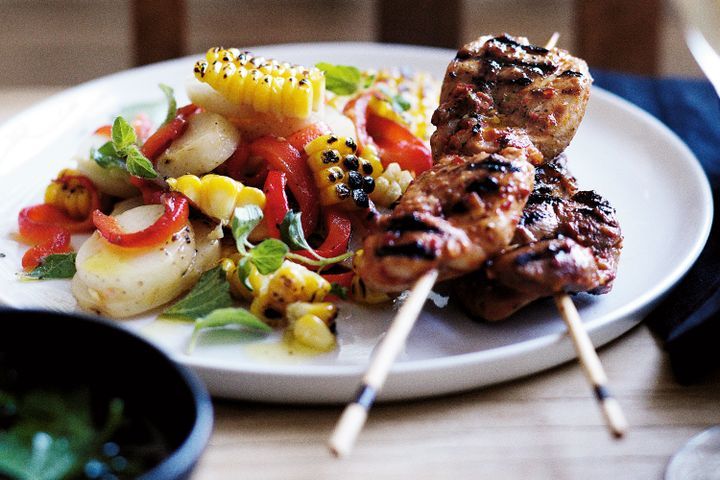Cooking Meat Grilled corn and potato salad with piri piri chicken