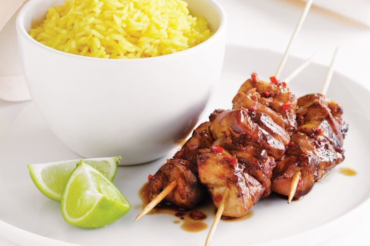 Cooking Meat Kecap manis chicken skewers with turmeric rice