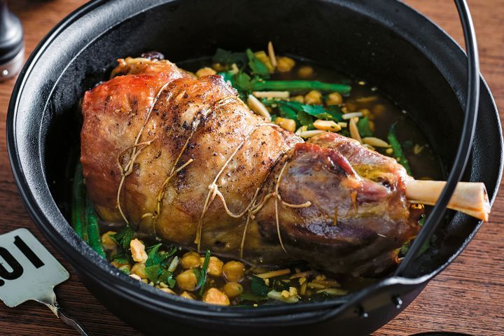 Cooking Meat Lamb shoulder with chickpeas and sherry