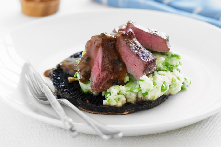Cooking Meat Lamb with pea mash and peppercorn sauce