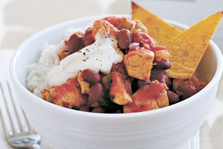 Cooking Meat Mexican chicken with tortilla chips