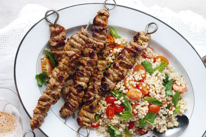 Cooking Meat Moroccan beef brochettes with pearl couscous salad