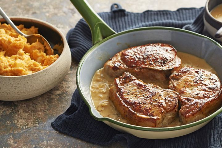 Cooking Meat Pork chops with sage-onion gravy and smashed root vegetables