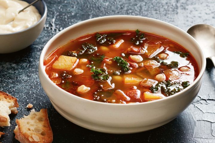 Cooking Meat Potato soup with kale, chorizo, chickpeas and aioli