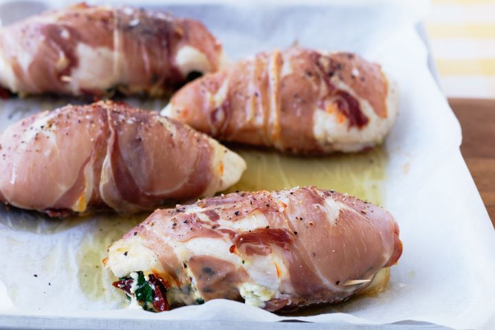 Cooking Meat Prosciutto-wrapped chicken with ricotta, spinach and sun-dried tomato