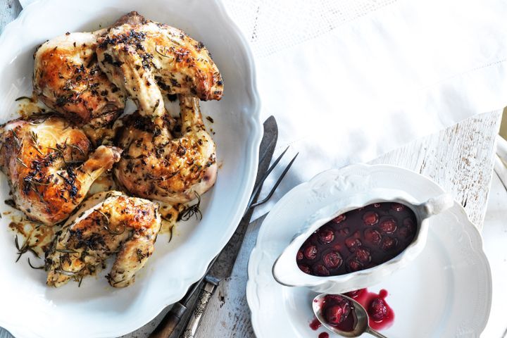 Cooking Meat Roast chicken with cherries in red wine
