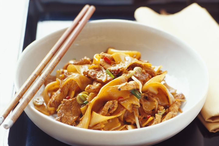 Cooking Meat Singapore-style noodles