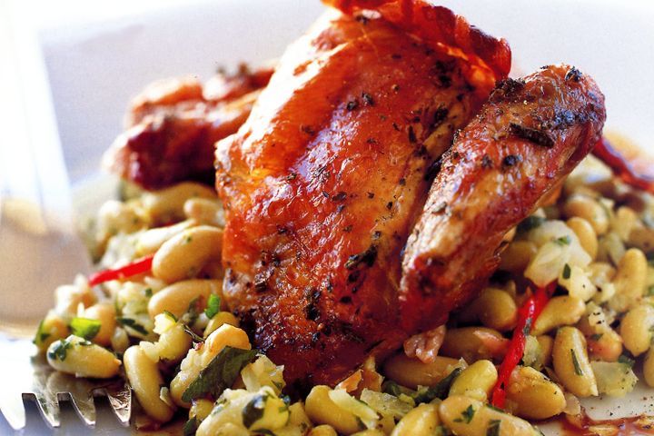 Cooking Meat Spring chicken with flageolet beans and pancetta