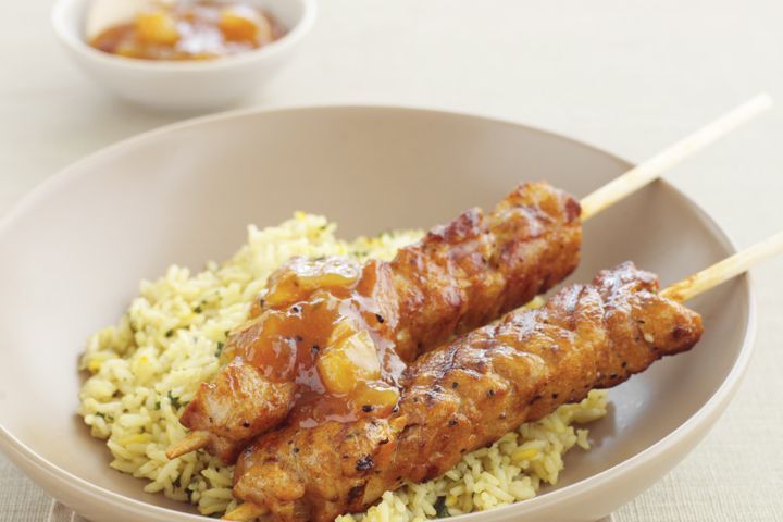 Cooking Meat Tandoori chicken kebabs with fragrant rice
