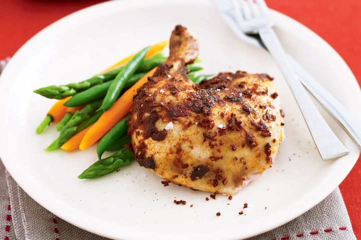 Cooking Meat Whole spiced chicken