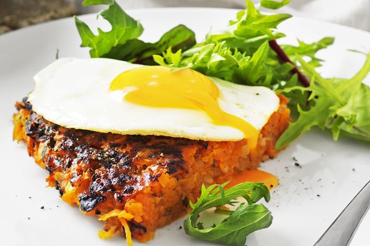 Cooking Eggs Bacon and sweet potato rosti with fried eggs