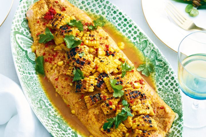 Cooking Fish Baked salmon with corn and spices