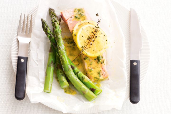 Cooking Fish Baked salmon with lemon, thyme and asparagus
