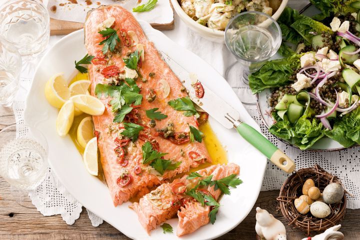 Cooking Fish Barbecued ocean trout with garlic and parsley dressing