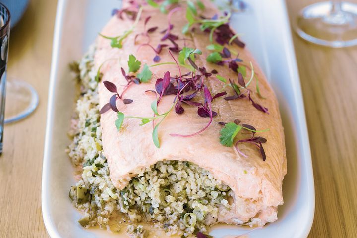 Cooking Fish Barbecued whole salmon with cracked wheat stuffing and coriander cream