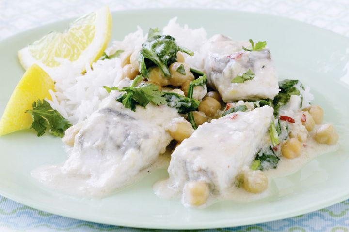 Cooking Fish Barramundi and chickpea curry with spinach