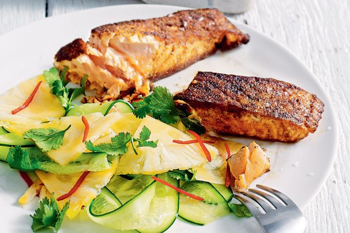 Cooking Fish Cajun salmon with pineapple salad