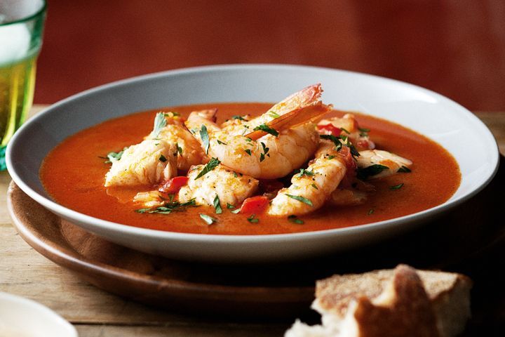 Cooking Fish Caldereta (Spanish seafood stew)