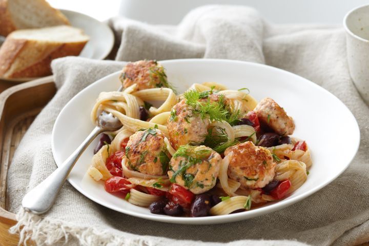 Cooking Fish Fettuccine with salmon polpette, tomatoes and olives