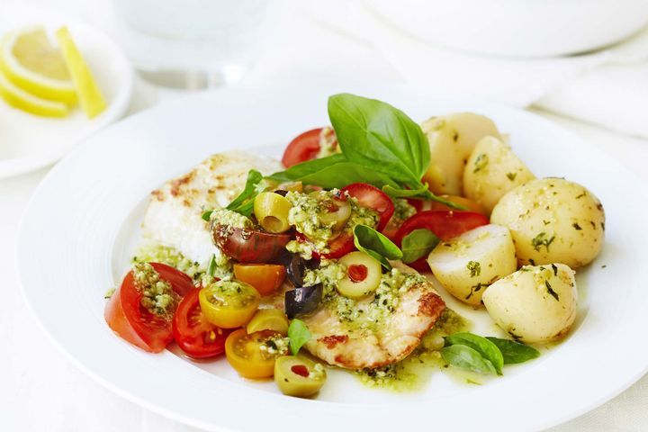 Cooking Fish Pan-fried ling with tomato and olive salad