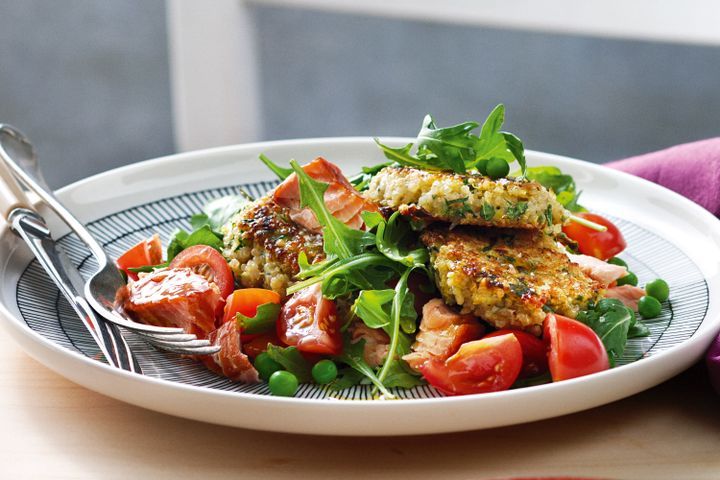 Cooking Fish Quinoa fritters with salmon and pea salad