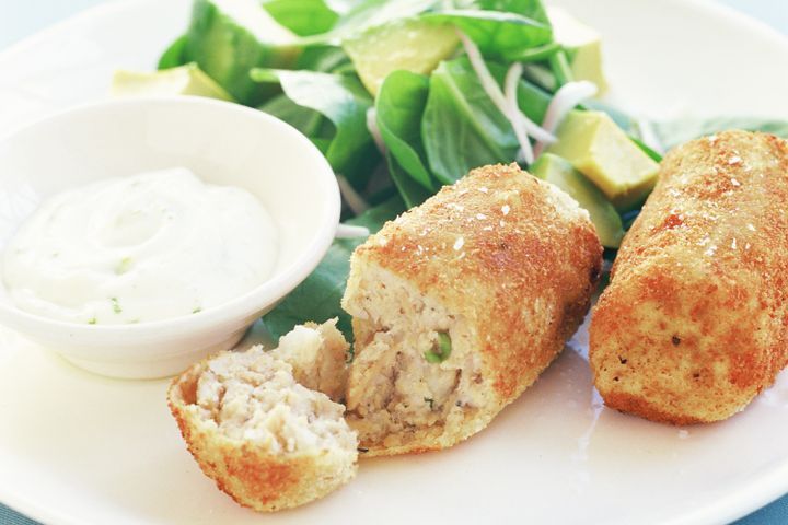 Cooking Fish Salmon croquettes with avocado salad