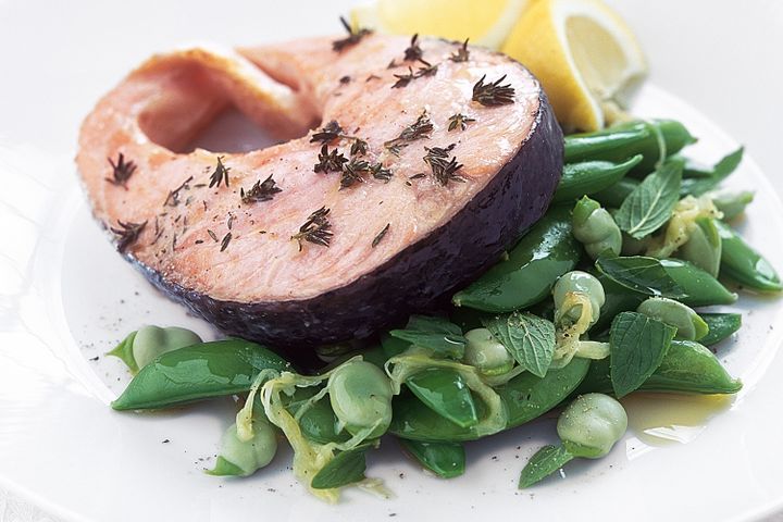 Cooking Fish Salmon cutlets with minted broad beans and sugar snaps