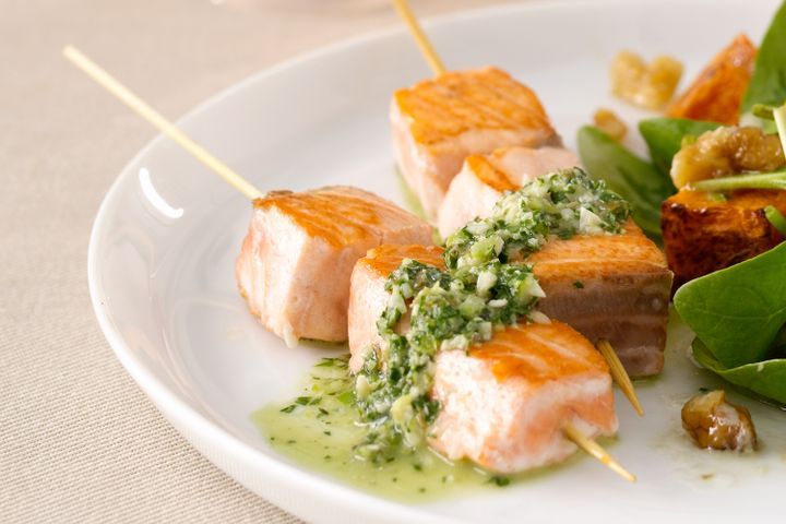 Cooking Fish Salmon skewers with almond salsa verde
