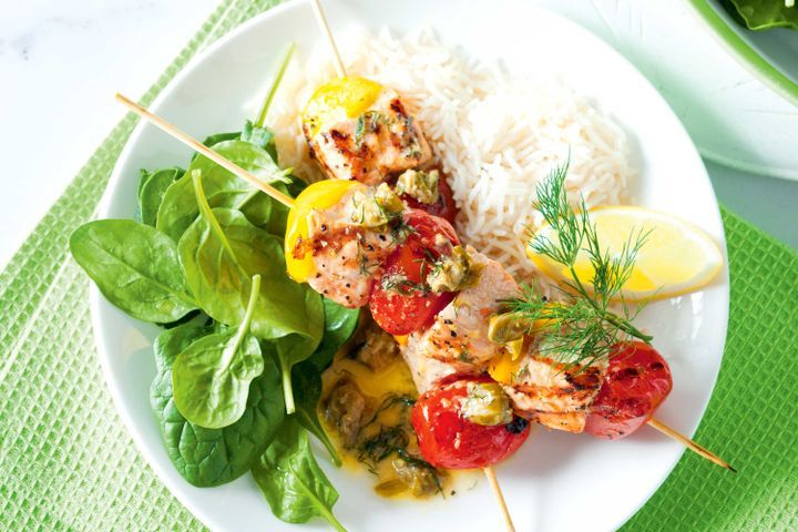 Cooking Fish Salmon skewers with caper and dill butter sauce