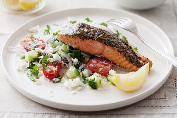 Cooking Fish Salmon with Greek rice salad