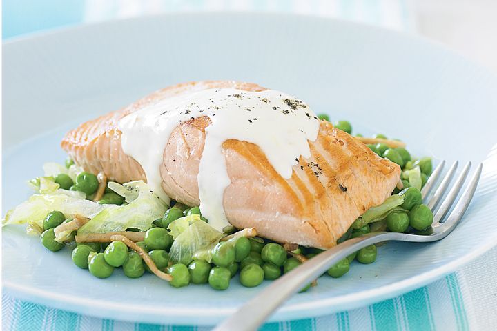 Cooking Fish Salmon with peas, bacon and lettuce