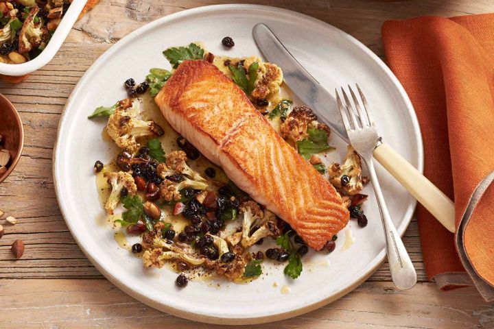 Cooking Fish Salmon with roasted cauliflower and currant brown butter