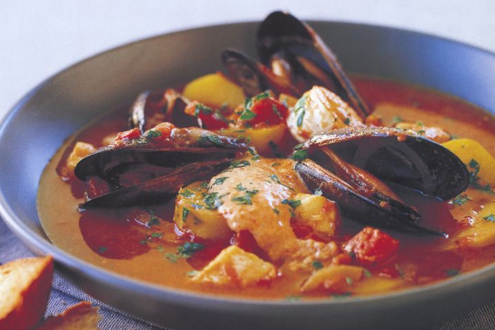 Cooking Fish Seafood stew with rouille