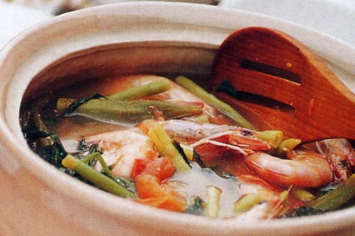 Cooking Fish Sinigang (sour soup)