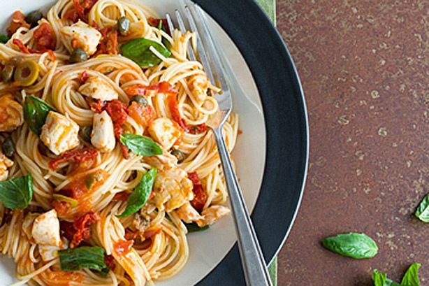 Cooking Fish Spaghetti with snapper, oregano, olives and sun-dried tomatoes