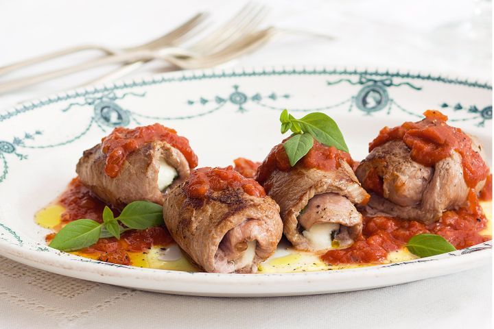 Cooking Fish Veal involtini in tomato sauce