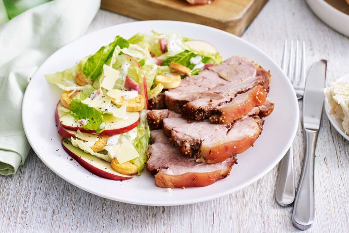 Cooking Meat Caraway and mustard roast pork with apple Caesar salad