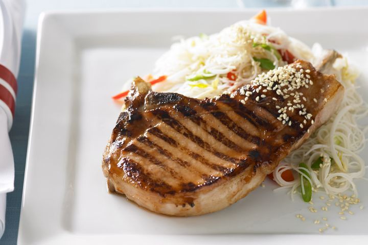 Cooking Meat Char siu pork with noodle and sesame salad