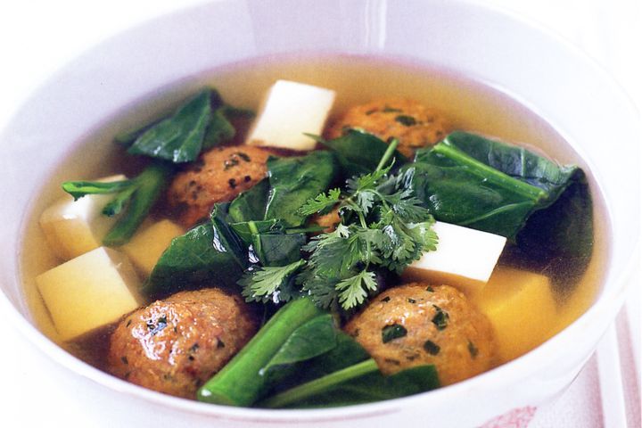 Cooking Meat Chicken broth with pork dumplings and chinese broccoli