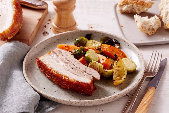 Cooking Meat Crispy salt and pepper pork belly with lemon-roasted Brussels sprouts